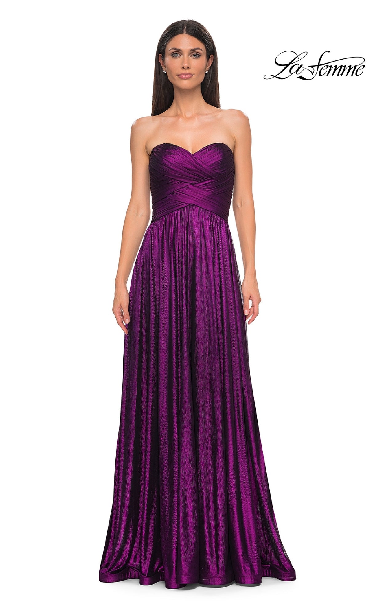 A woman in the Strapless Long Metallic Prom Dress: La Femme 32382 in purple satin poses before a white background, with the